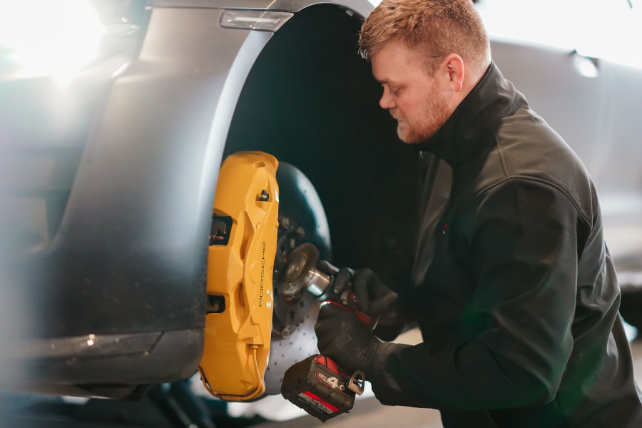 A mechanic performing break repairs